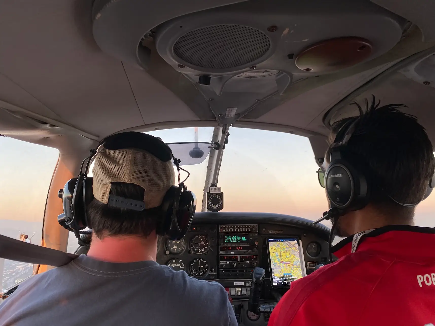Students at Essence Flight School in Van Nuys Airport learning to fly in a Piper Archer cockpit